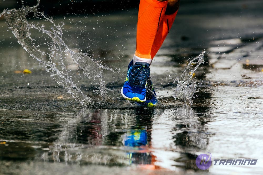 a person runs in rain 