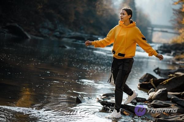 a woman runs in waterproof running shoes for women