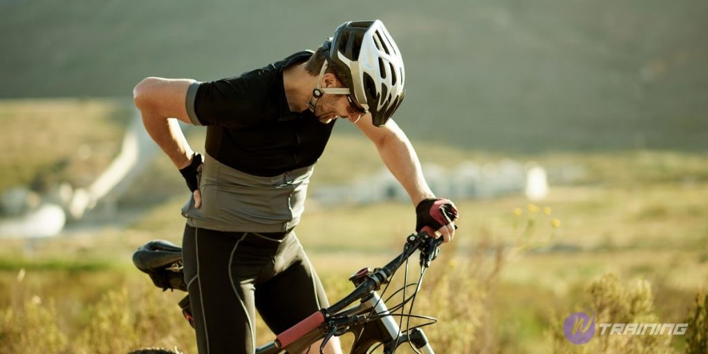 a man suffers from cycling lower back pain